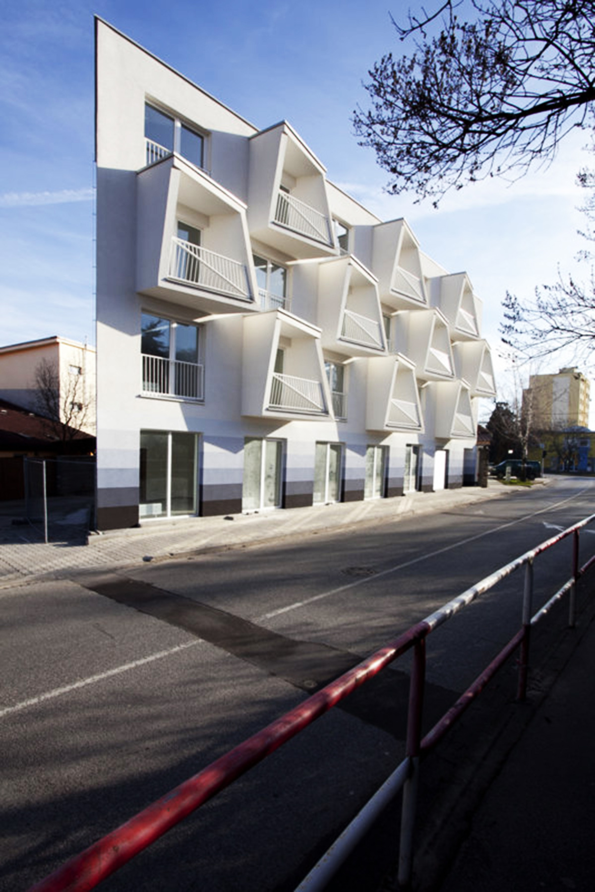 “North star” apartment shines out with its distortional balconies subverting the street facade