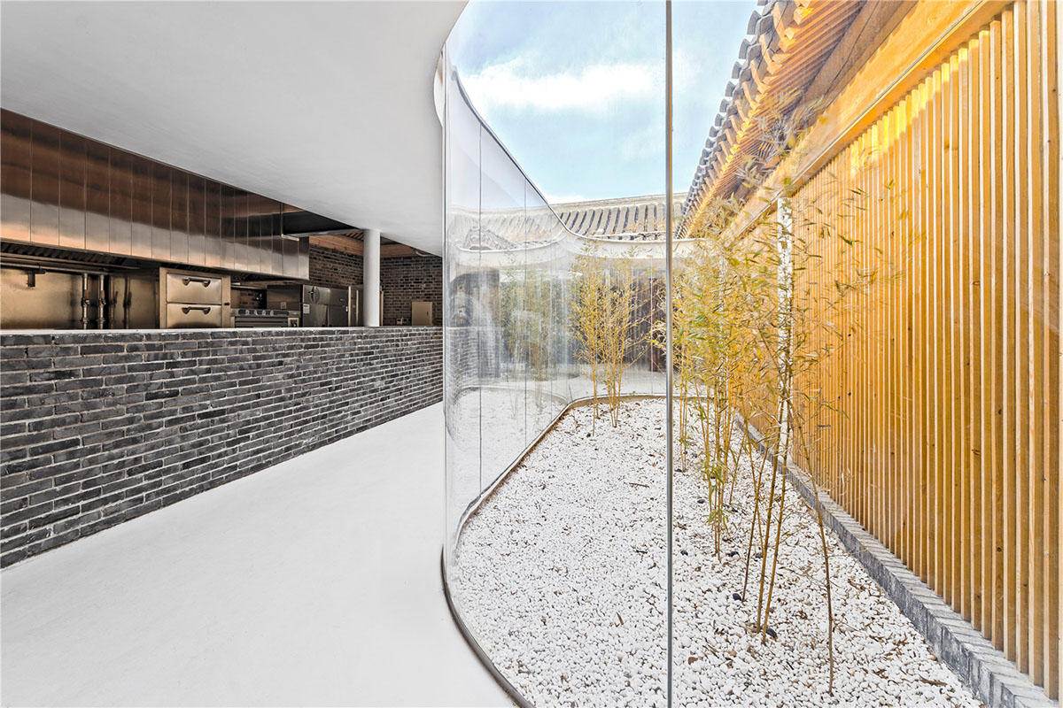 Tea House in Hutong is a new multi-functional space injected within old city
