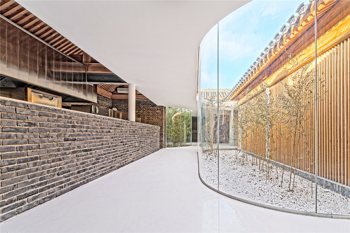 Tea House in Hutong is a new multi-functional space injected within old city