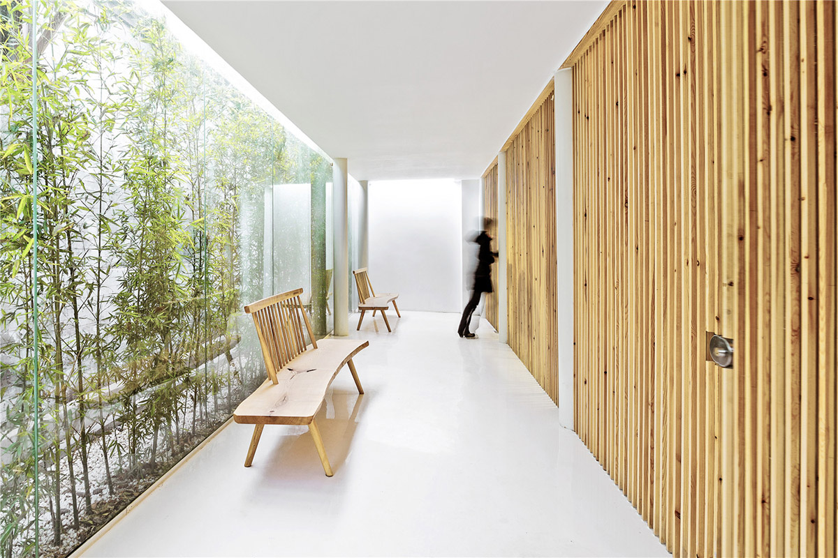 Tea House in Hutong is a new multi-functional space injected within old city