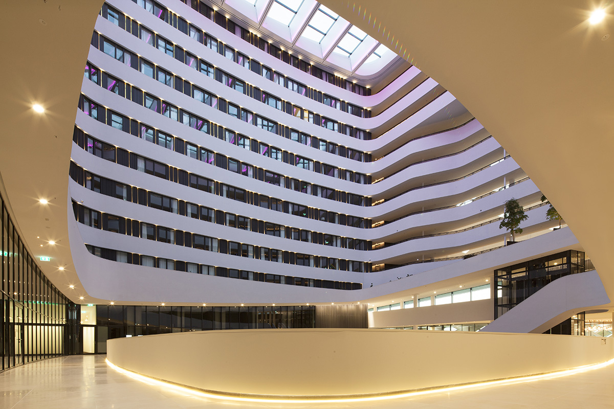 Mecanoo completed its new curvaceous building Hilton Amsterdam Airport Schiphol