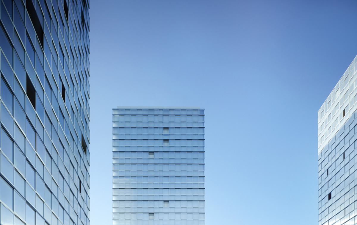 LAN’s Urban Renovation Lormont project reflects its facade with checkered patterns