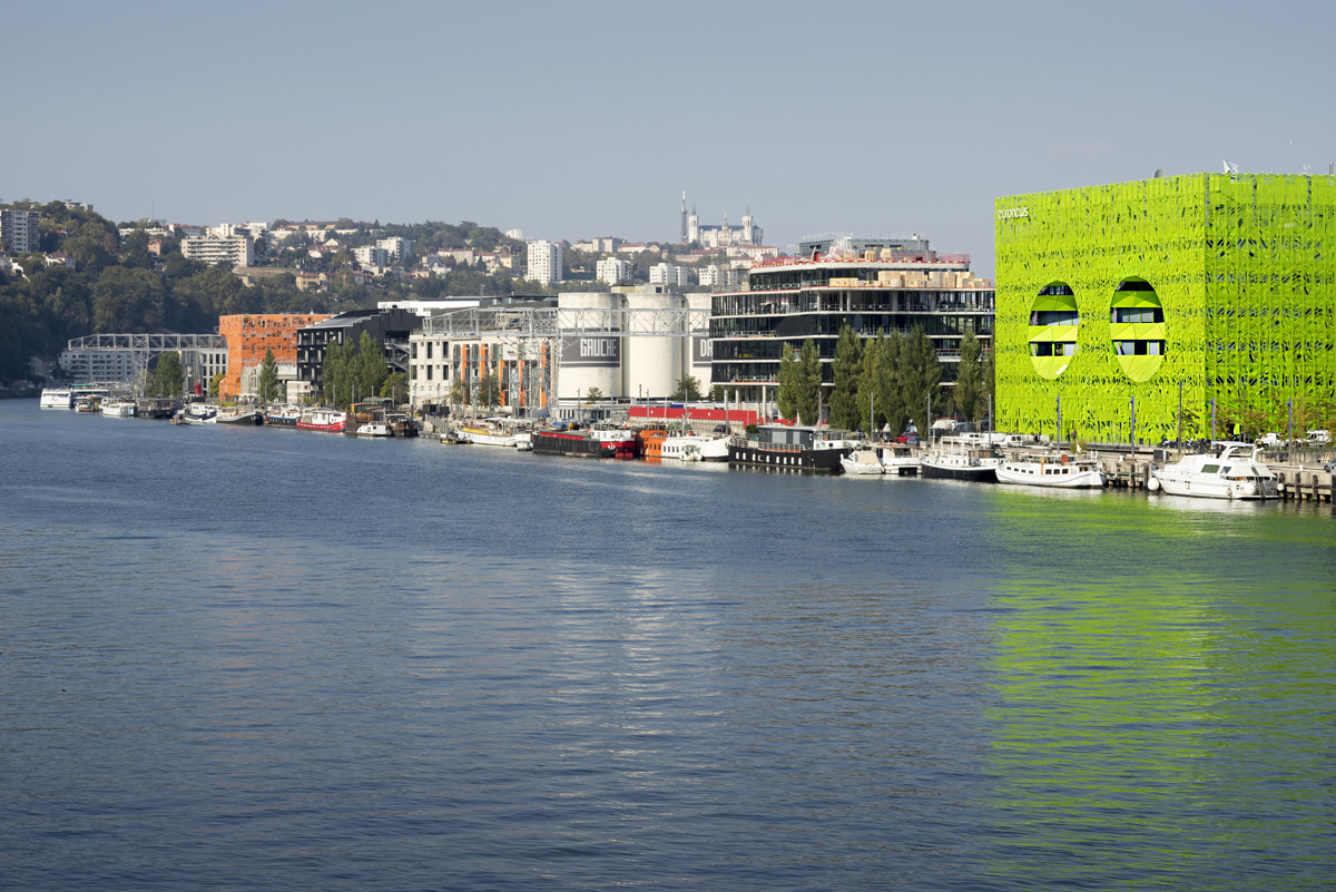 Jacob+Macfarlane’s Euronews HQ becomes a new iconic landmark with its luminous green presence