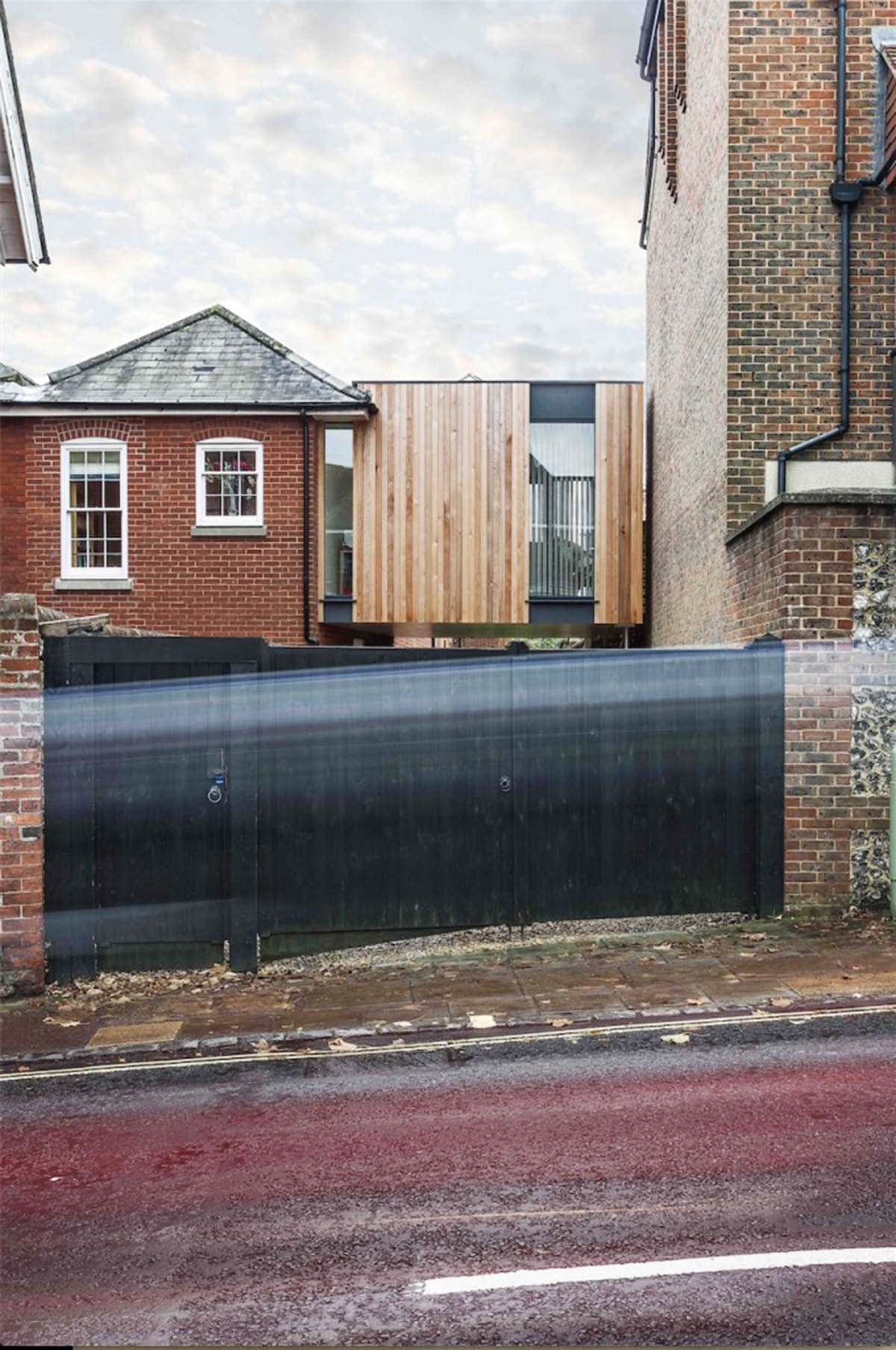 Adam Knibb Architects fills old school site with timber-box addition in Winchester