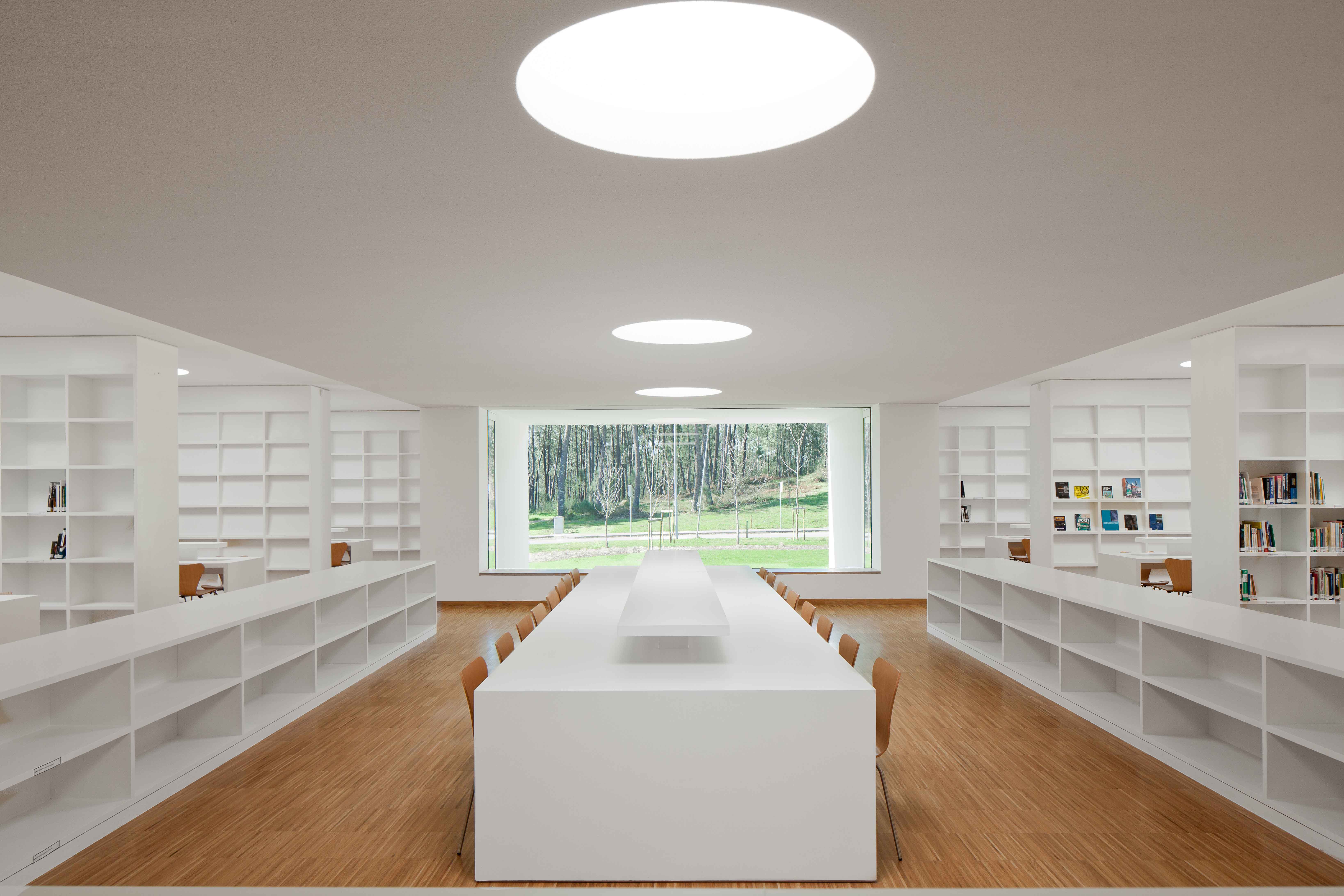 The new Melgaço Sports School is a pure and calm modernist building integrating with landscape