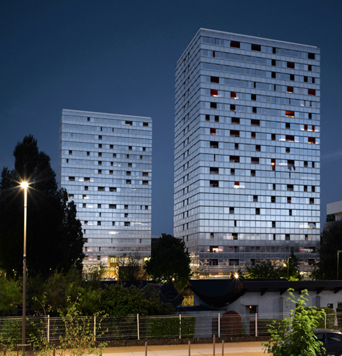 LAN’s Urban Renovation Lormont project reflects its facade with checkered patterns