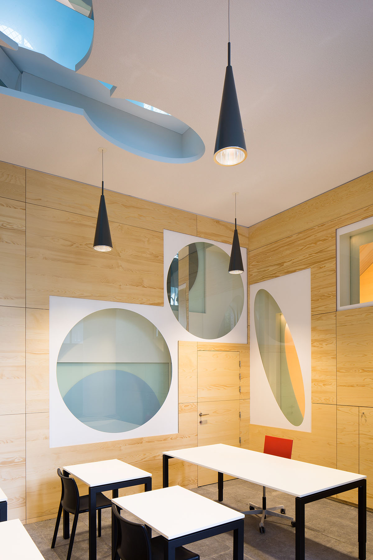 Architect Rob Hootsmans converts old church-style chapel into a new school in Belgium