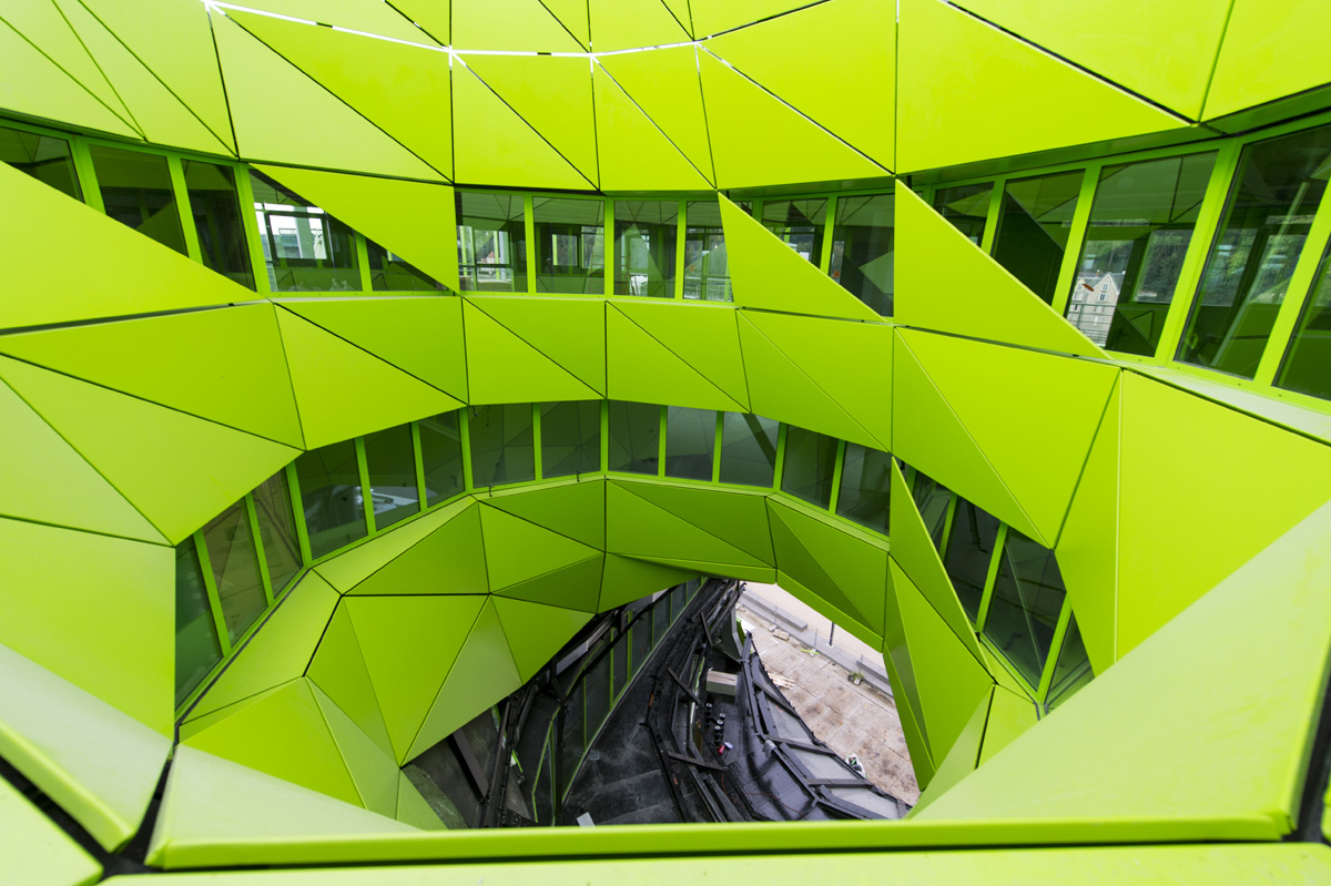 Jacob+Macfarlane’s Euronews HQ becomes a new iconic landmark with its luminous green presence