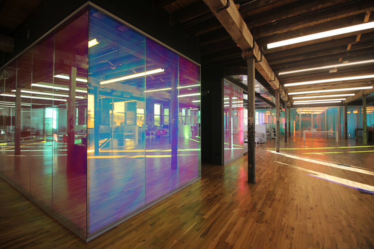 LEESER Architecture transforms an industrial building into office headquarters for Genius Media