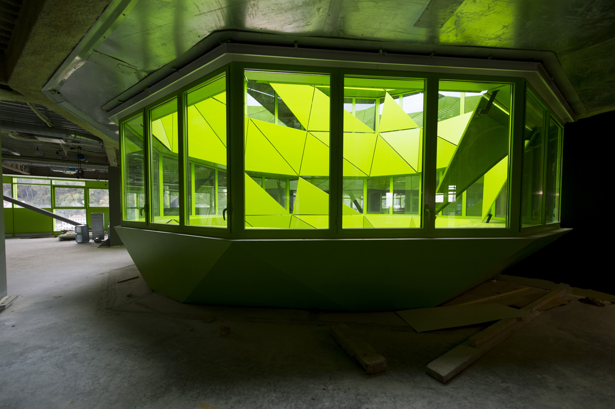 Jacob+Macfarlane’s Euronews HQ becomes a new iconic landmark with its luminous green presence