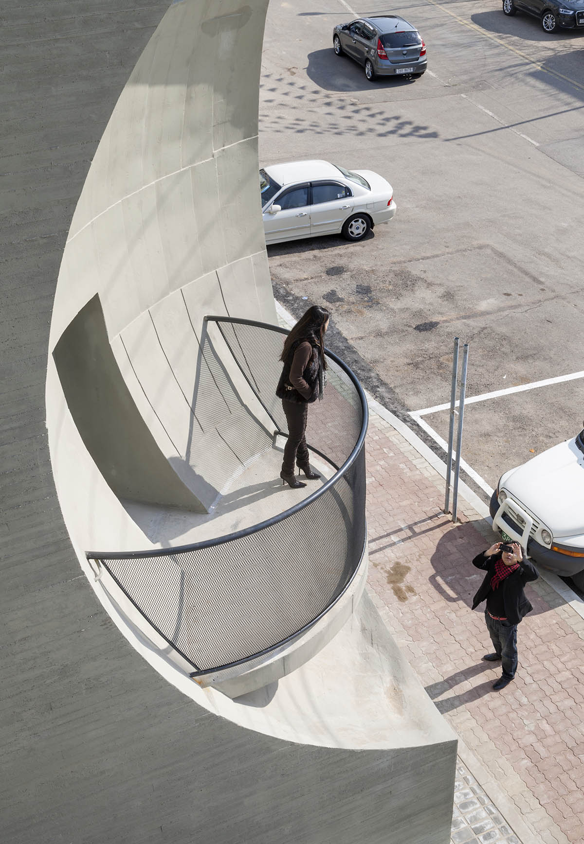 Moon Hoon Architects completed ’’Two Moon’’: a multi use building comprises two-segmented pieces