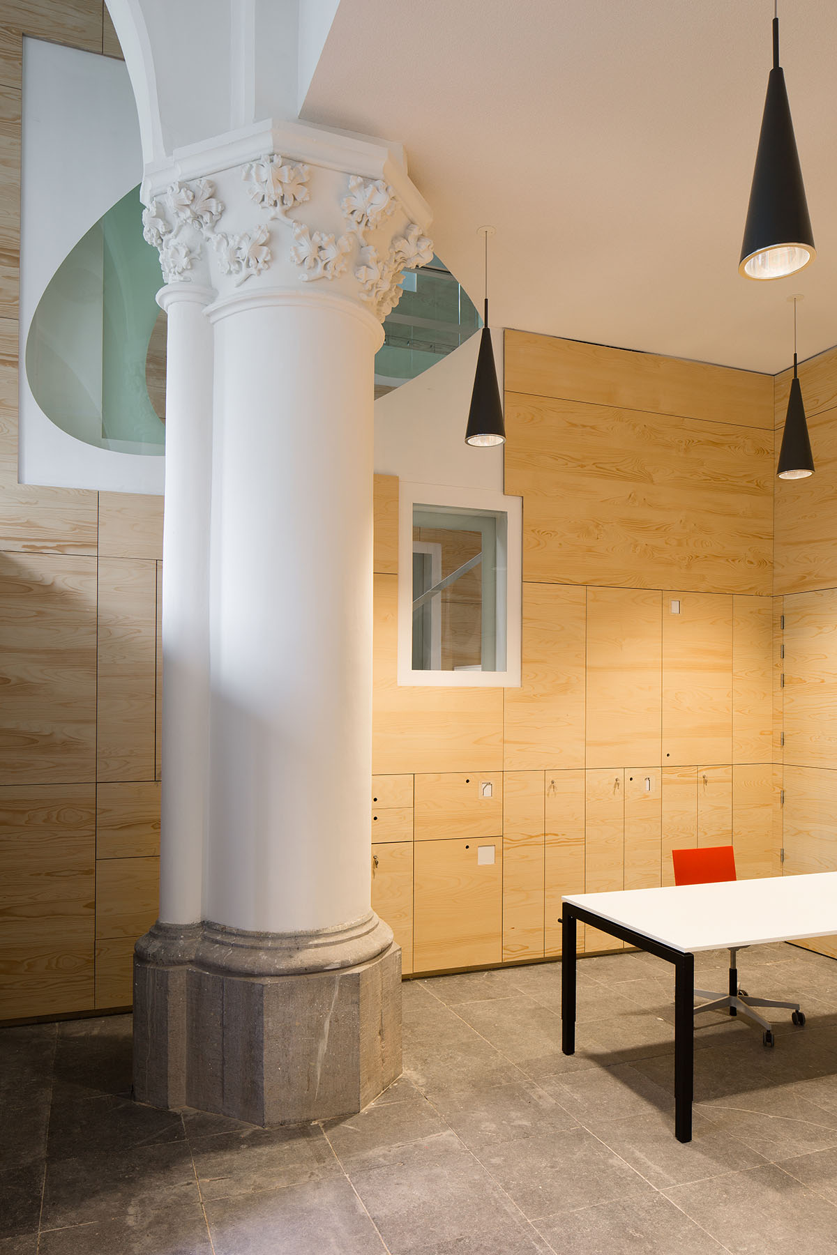 Architect Rob Hootsmans converts old church-style chapel into a new school in Belgium