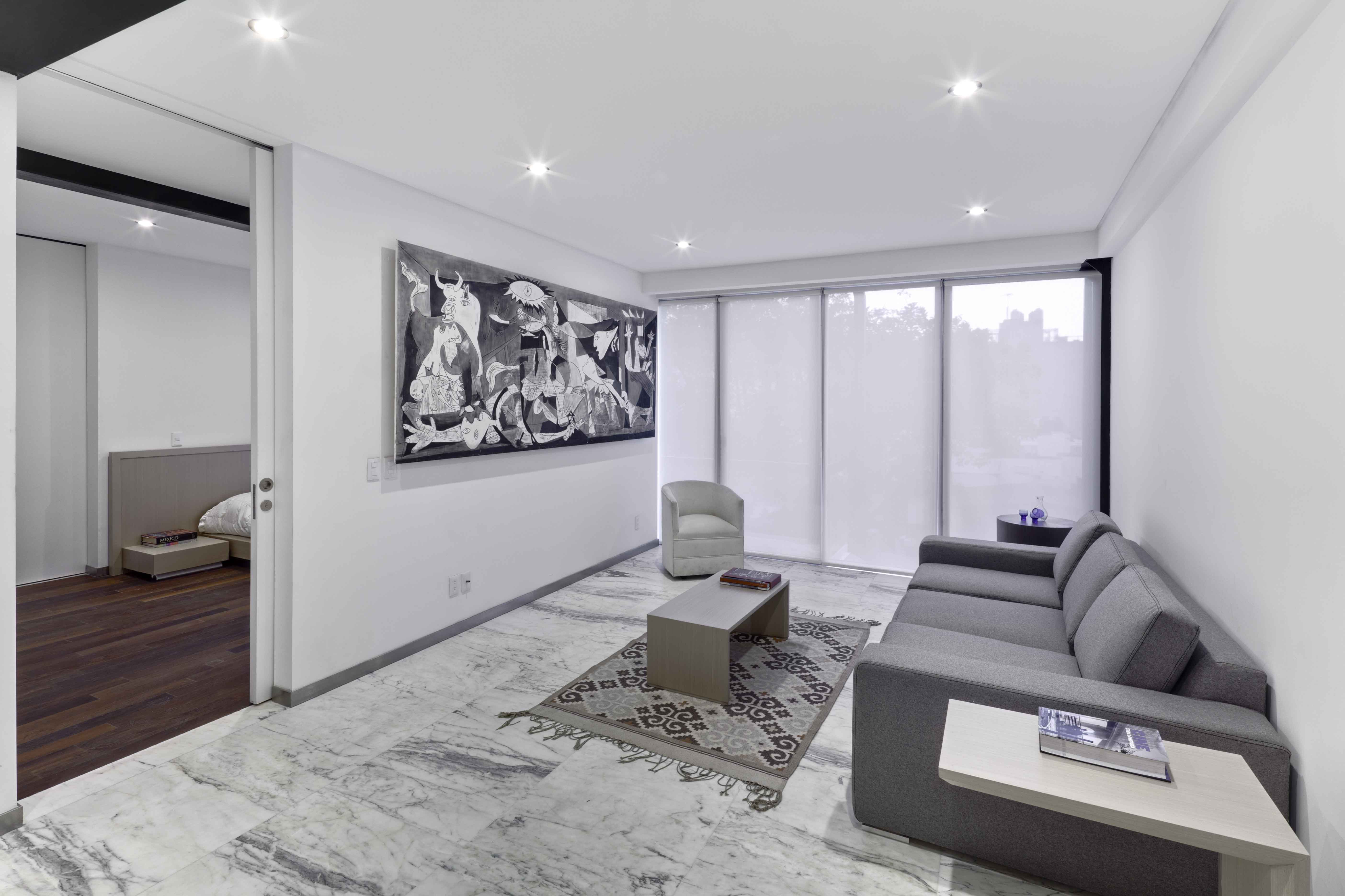 LVII Apartments by Arquitectura En Movimiento