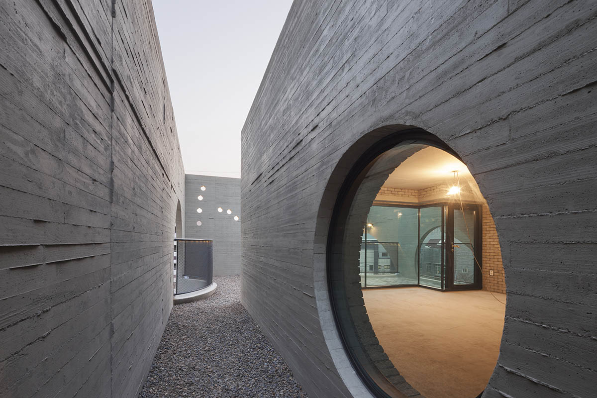 Moon Hoon Architects completed ’’Two Moon’’: a multi use building comprises two-segmented pieces