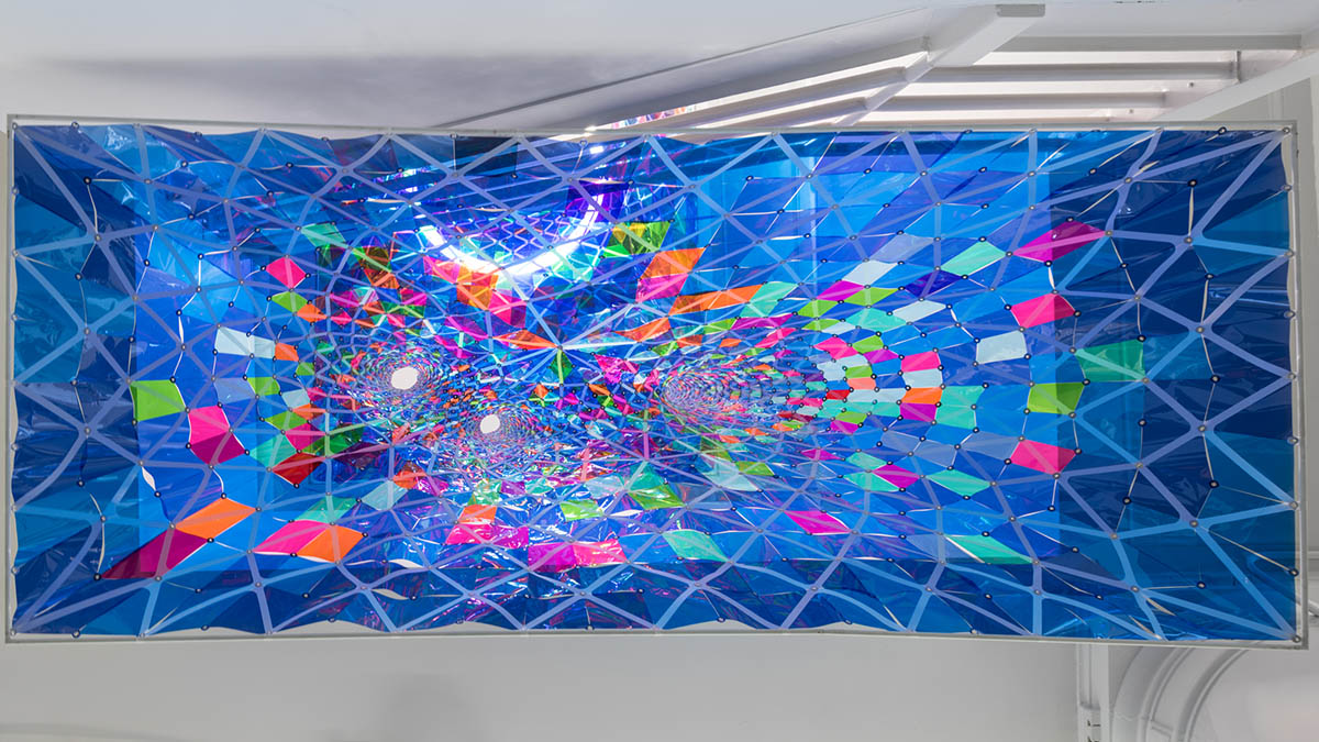 SOFTlab designs a percolating 3D stained glass installation for Behance New York office