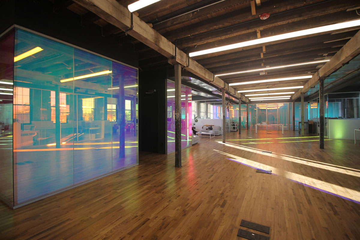 LEESER Architecture transforms an industrial building into office headquarters for Genius Media