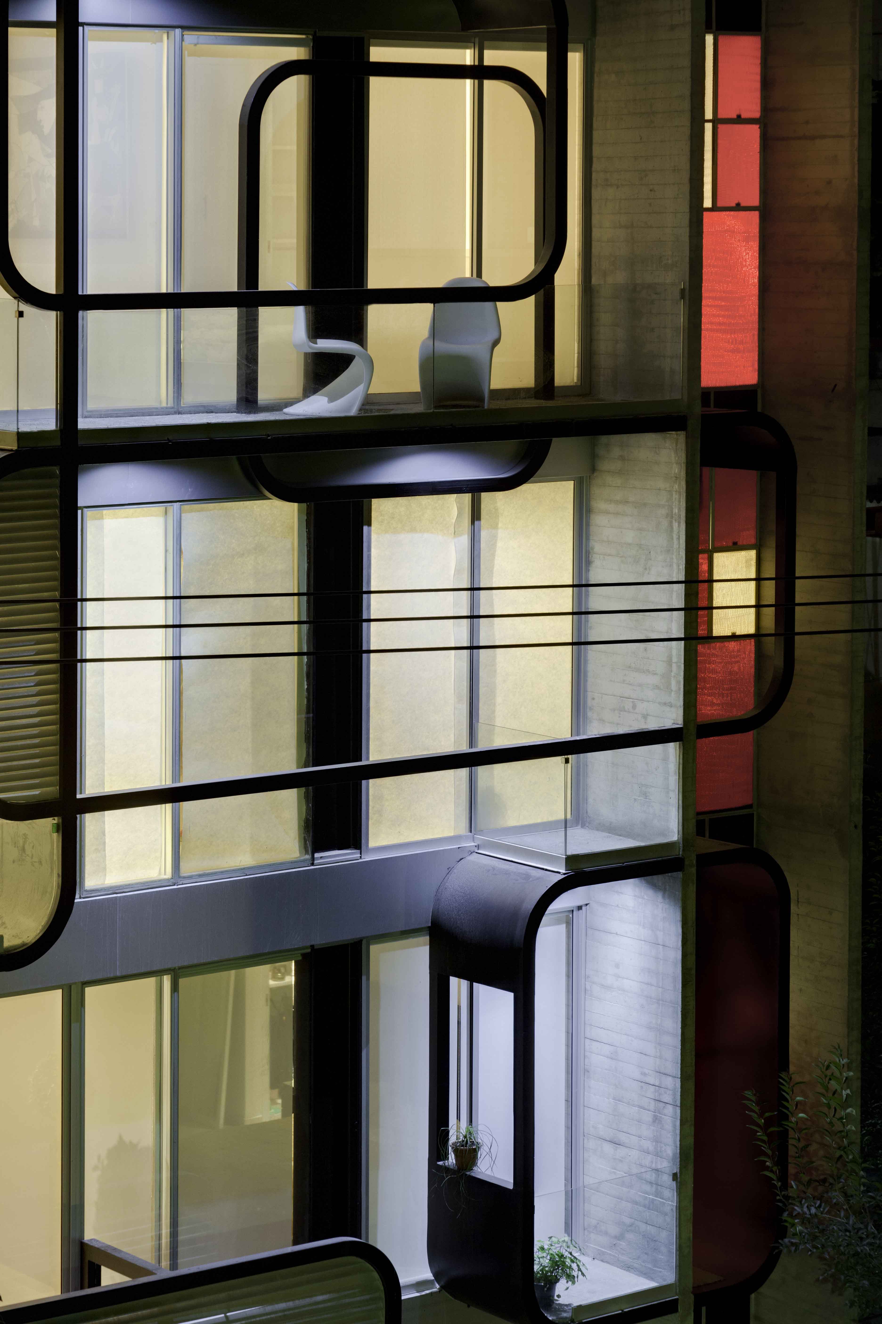 LVII Apartments by Arquitectura En Movimiento