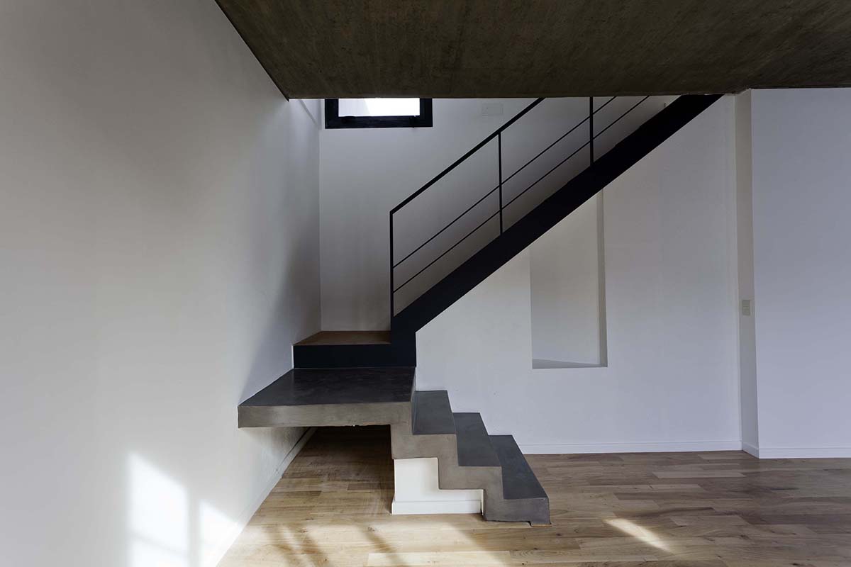 Two Houses Conde represented with various connections in its context designed by HM Architects