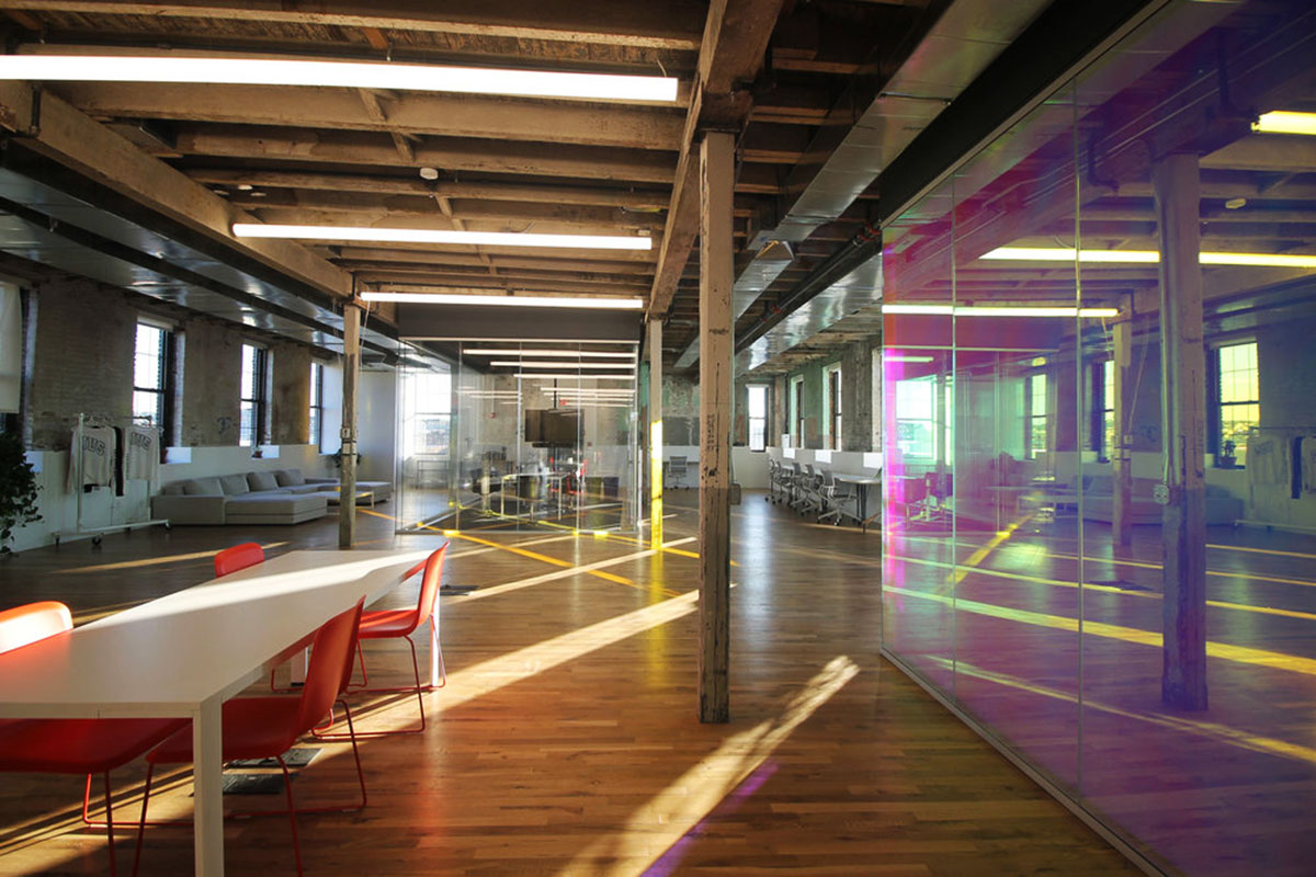 LEESER Architecture transforms an industrial building into office headquarters for Genius Media