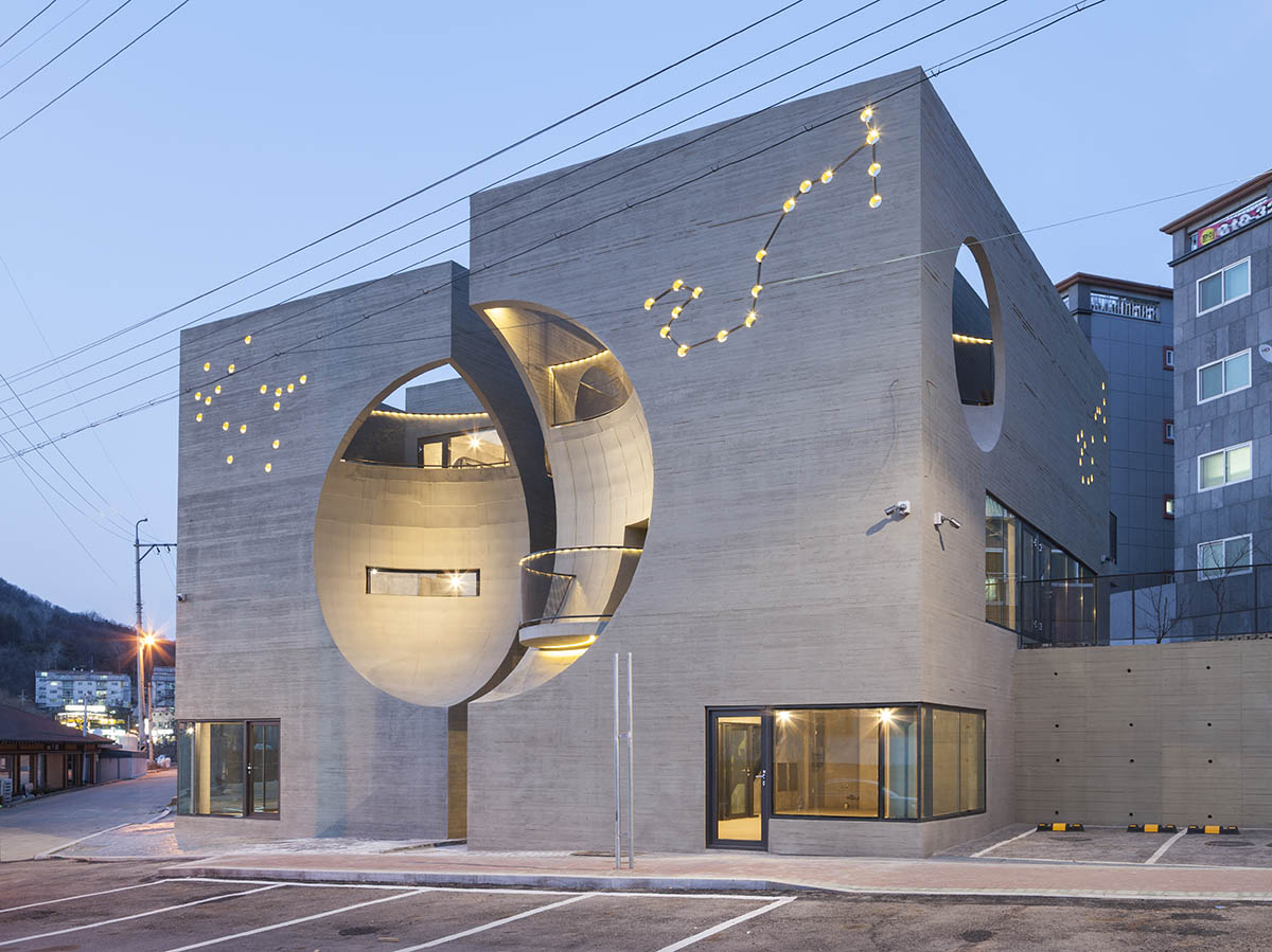 Moon Hoon Architects completed ’’Two Moon’’: a multi use building comprises two-segmented pieces
