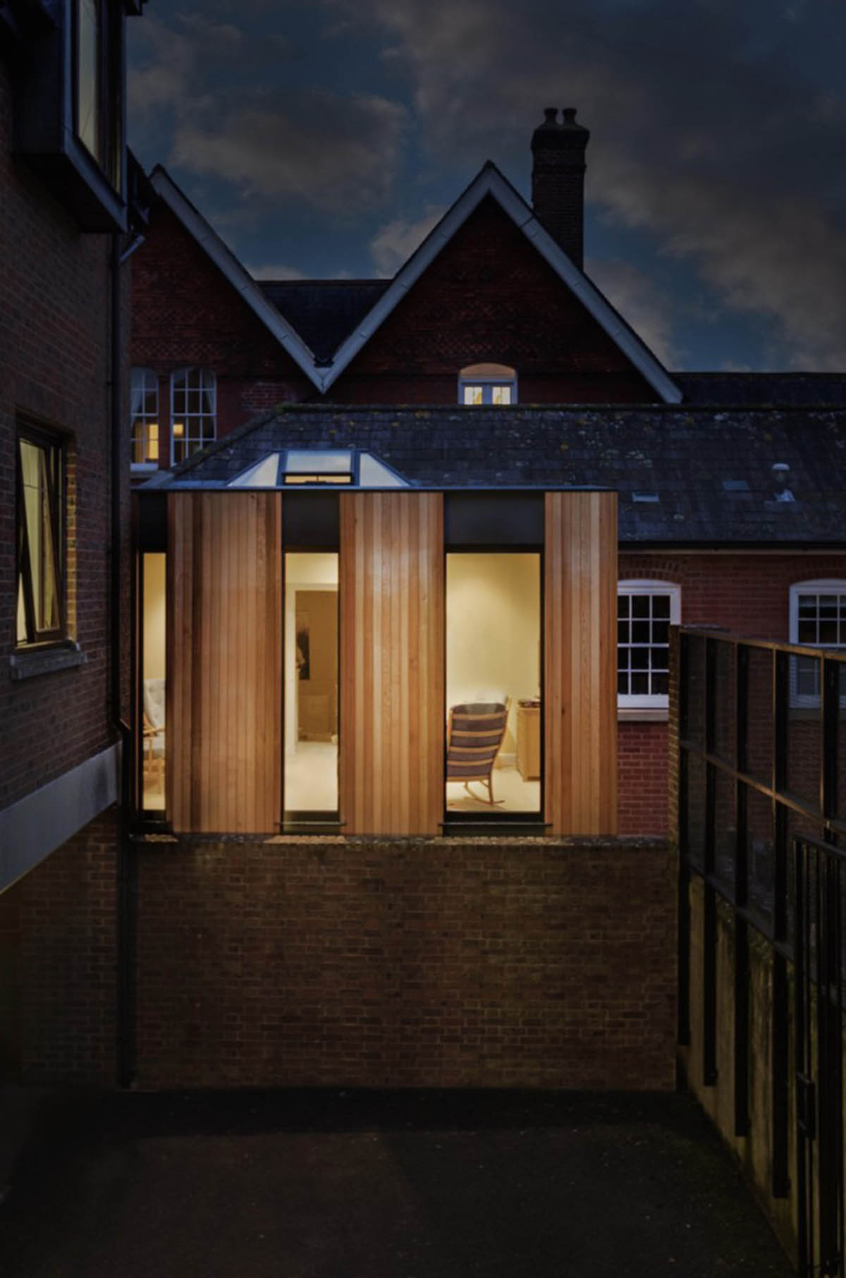 Adam Knibb Architects fills old school site with timber-box addition in Winchester