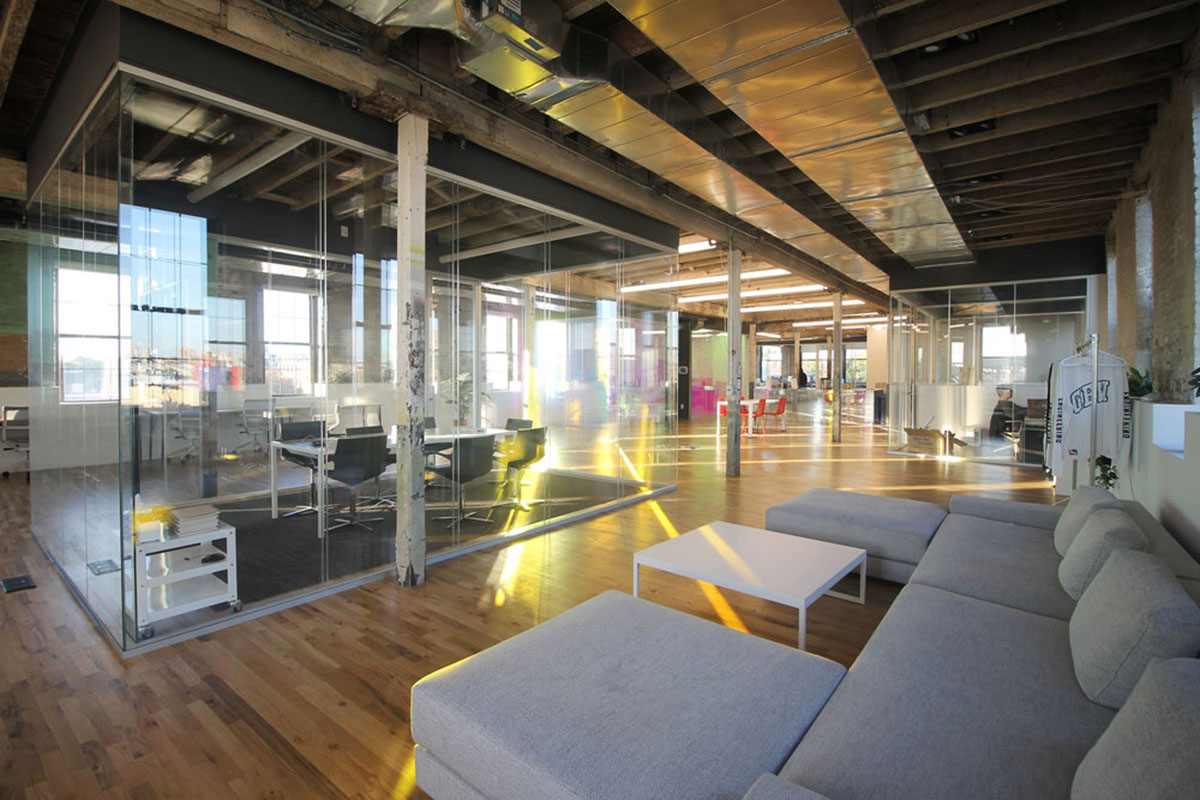 LEESER Architecture transforms an industrial building into office headquarters for Genius Media