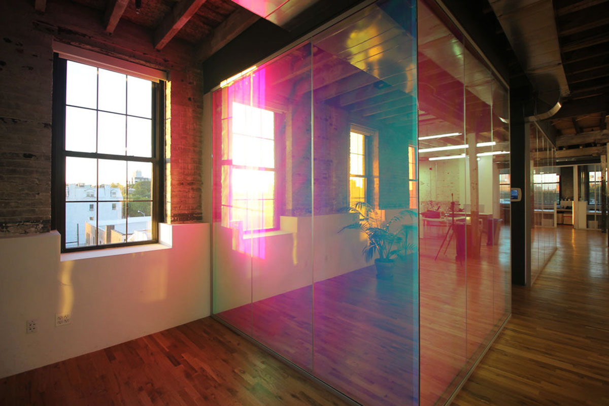 LEESER Architecture transforms an industrial building into office headquarters for Genius Media