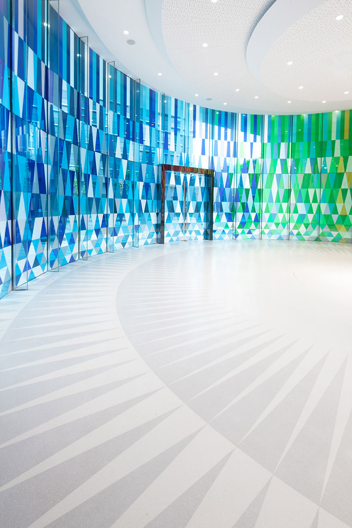 Rainbow Chapel is a rounded wedding space that explores the endless possibilities of glass