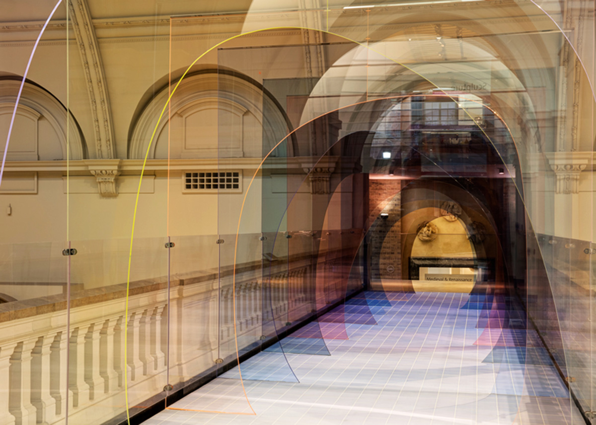 Designers play with our sense of perspective by installing this coloured acrylic tunnel in V&A