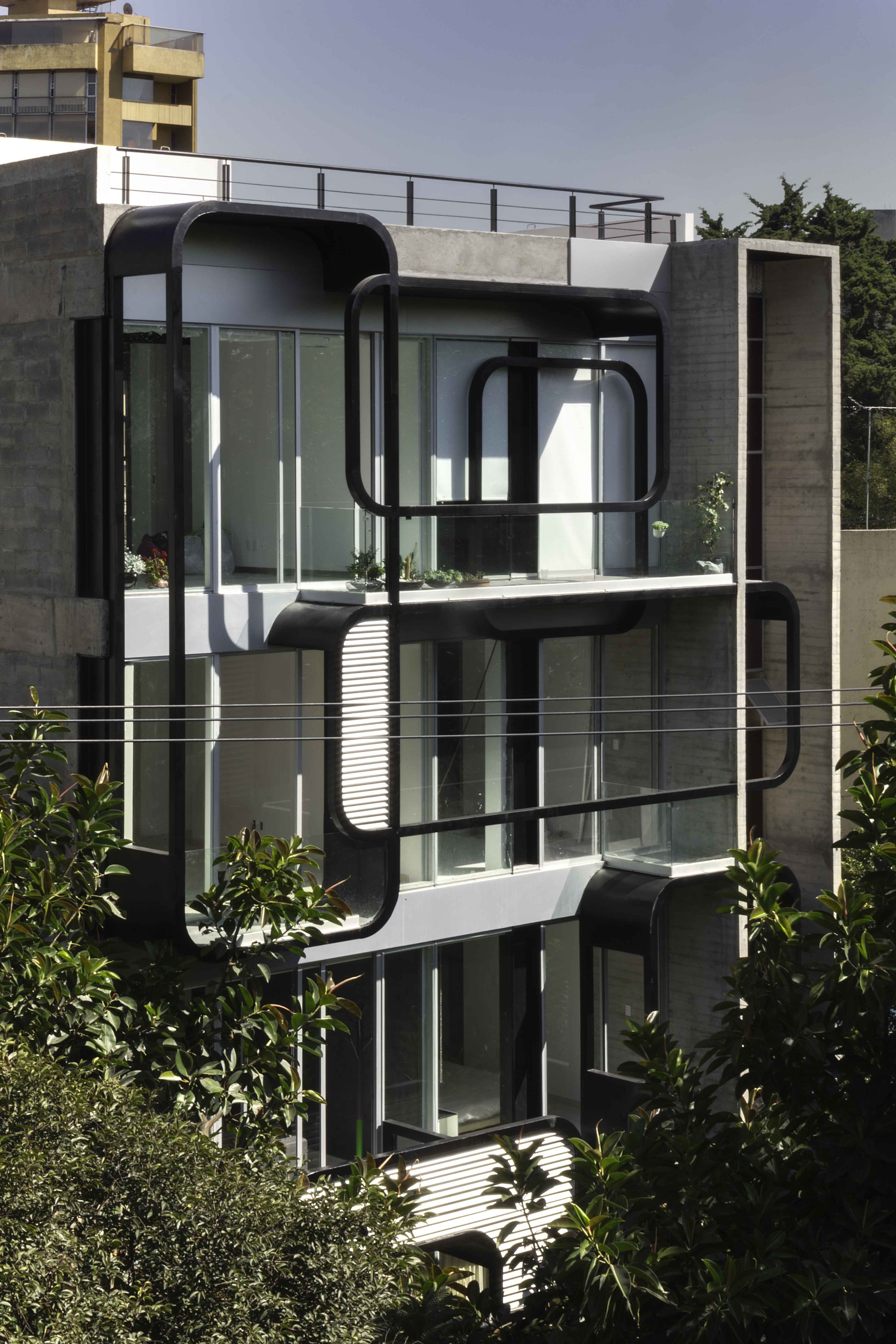 LVII Apartments by Arquitectura En Movimiento