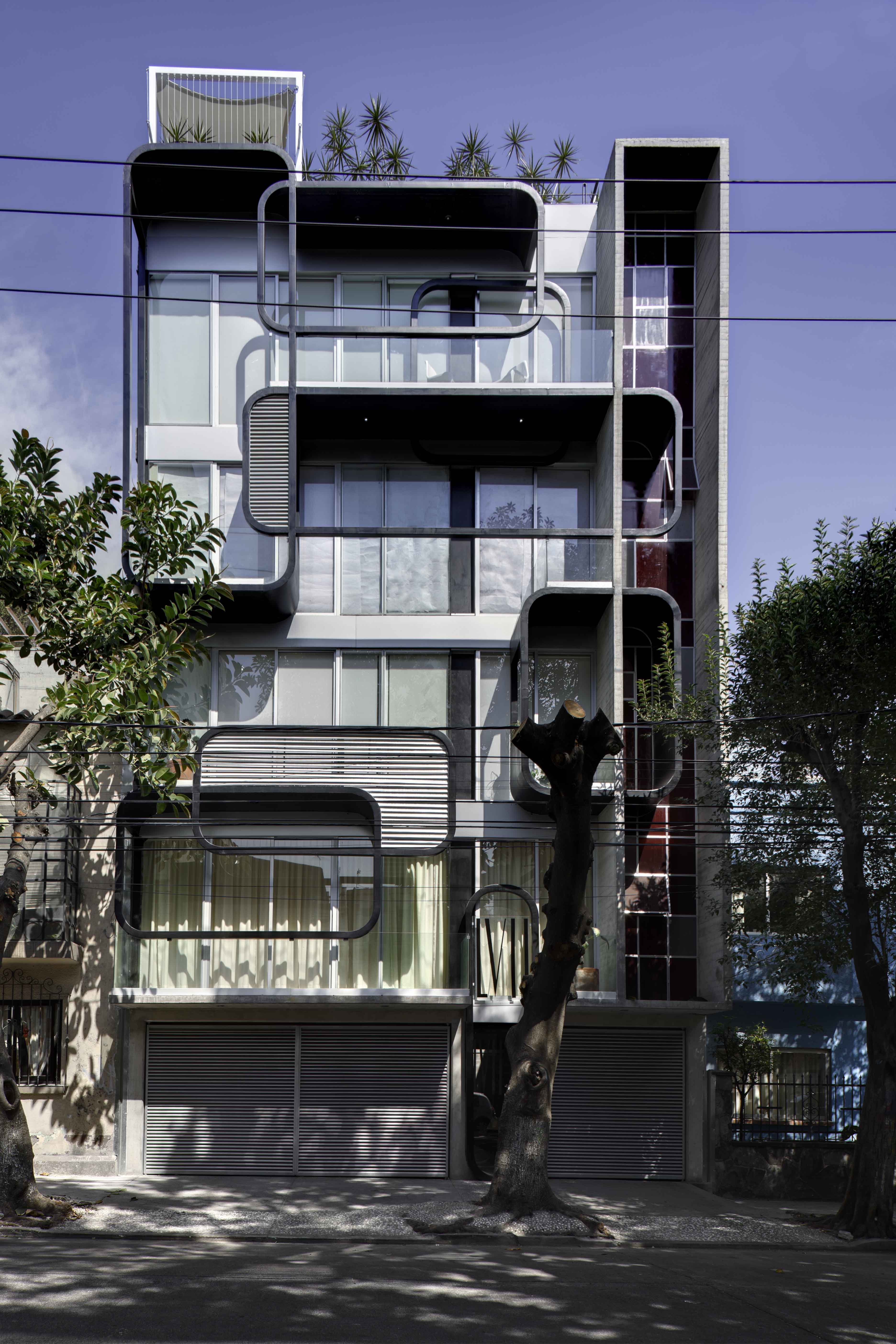 LVII Apartments by Arquitectura En Movimiento