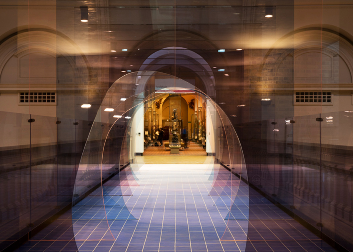Designers play with our sense of perspective by installing this coloured acrylic tunnel in V&A