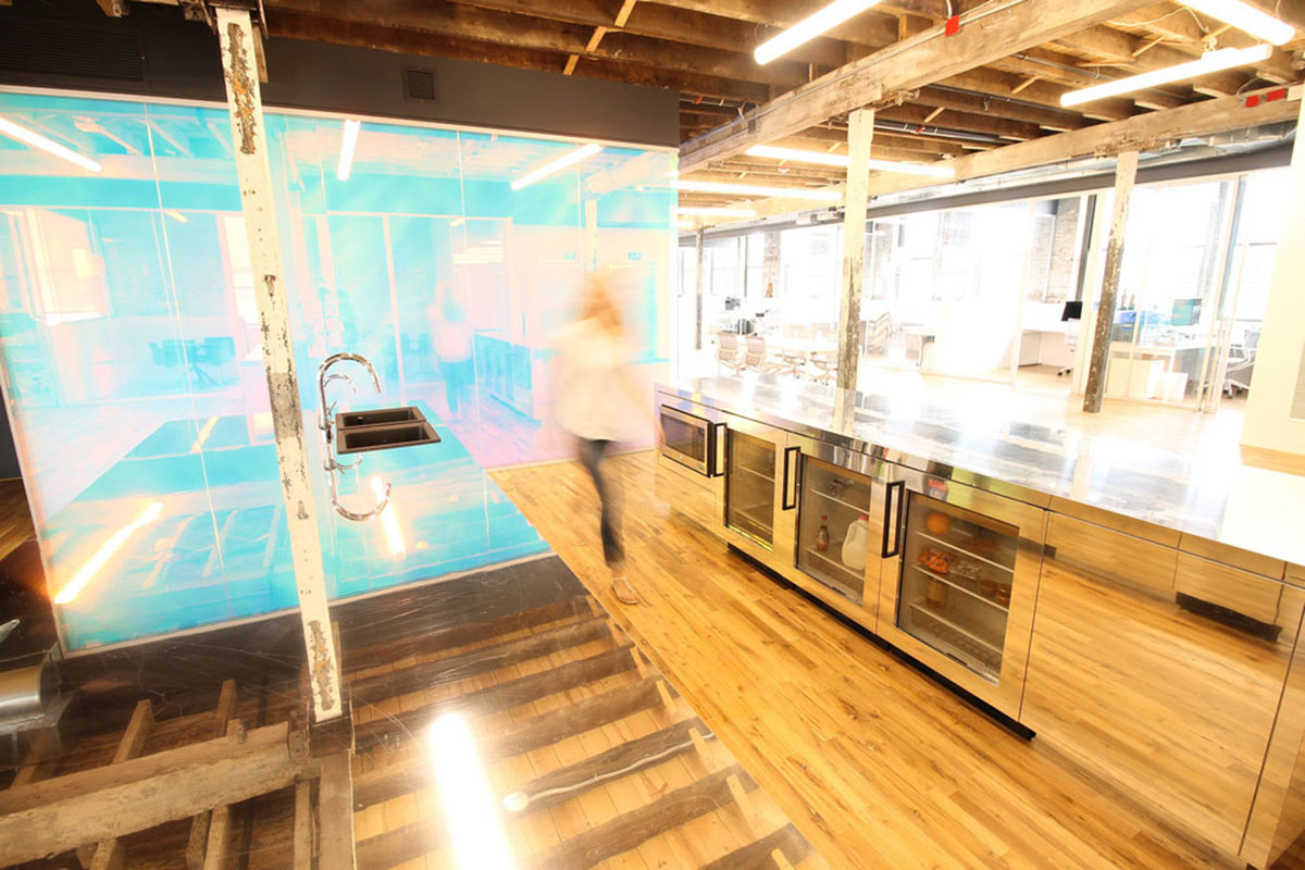 LEESER Architecture transforms an industrial building into office headquarters for Genius Media