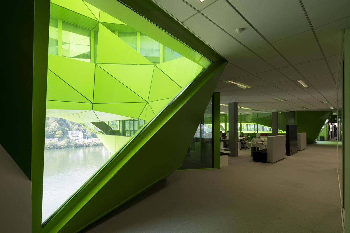 Jacob+Macfarlane’s Euronews HQ becomes a new iconic landmark with its luminous green presence