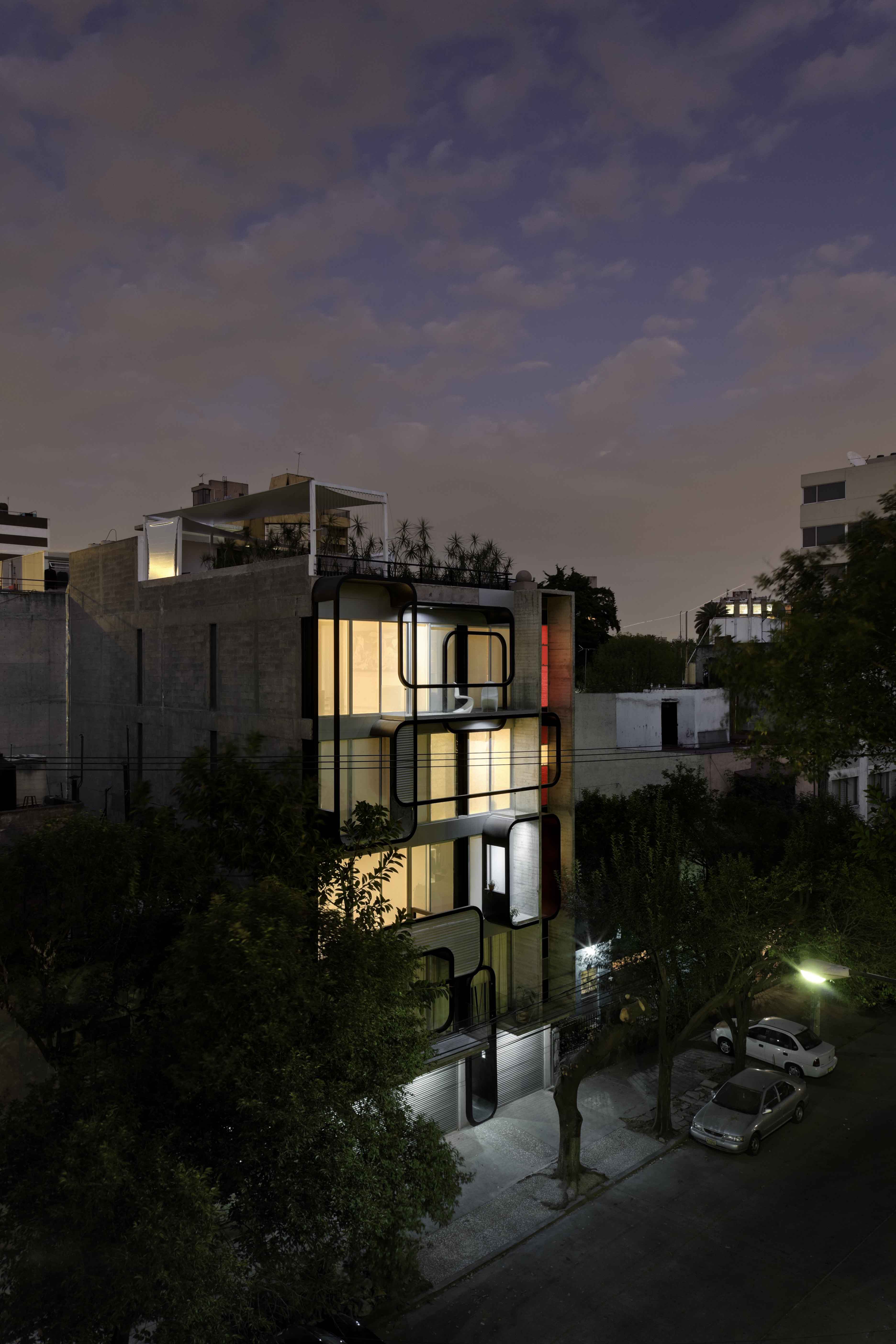 LVII Apartments by Arquitectura En Movimiento