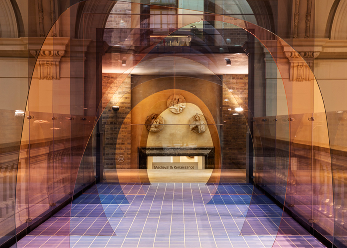 Designers play with our sense of perspective by installing this coloured acrylic tunnel in V&A