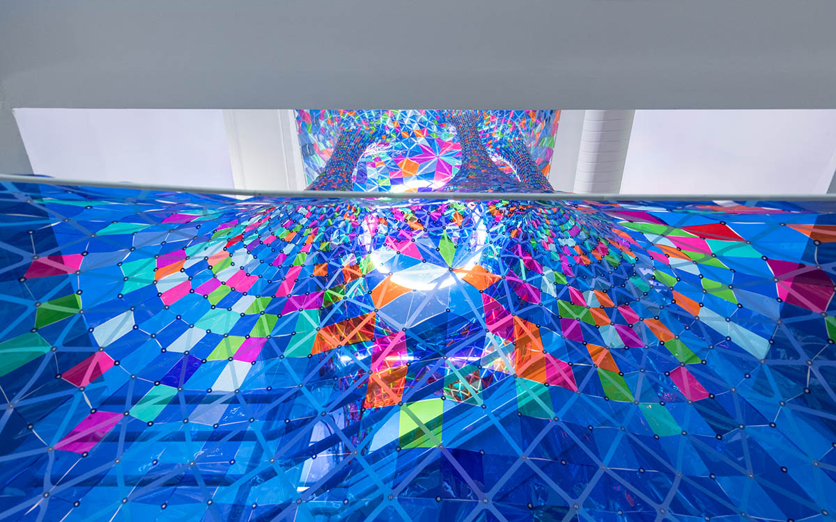 SOFTlab designs a percolating 3D stained glass installation for Behance New York office