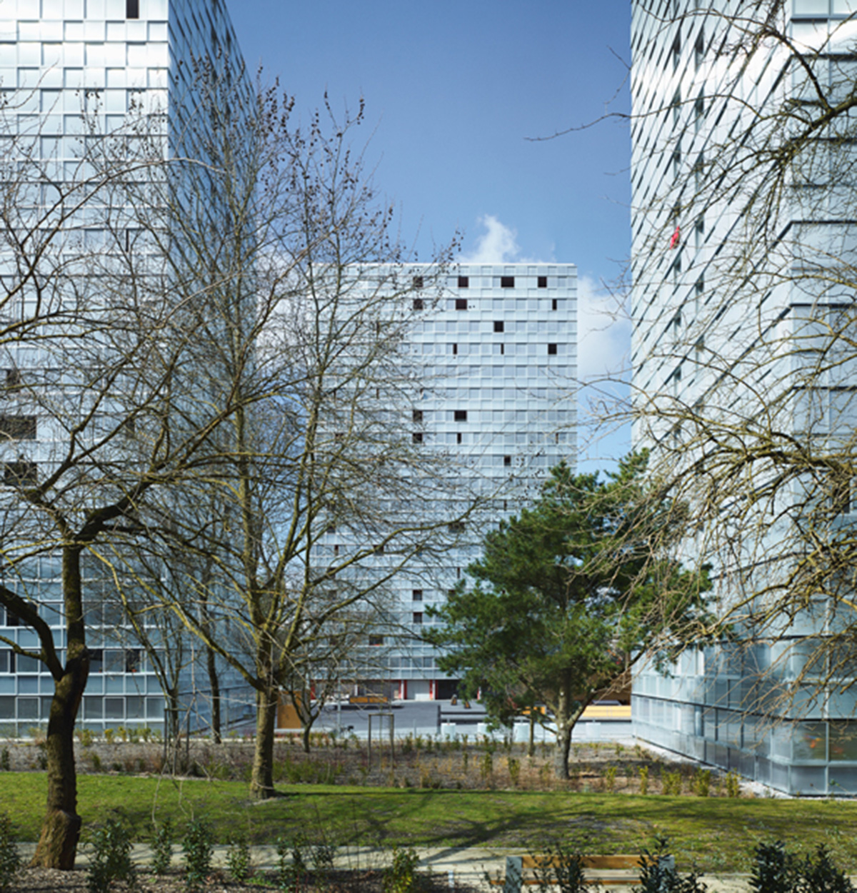 LAN’s Urban Renovation Lormont project reflects its facade with checkered patterns