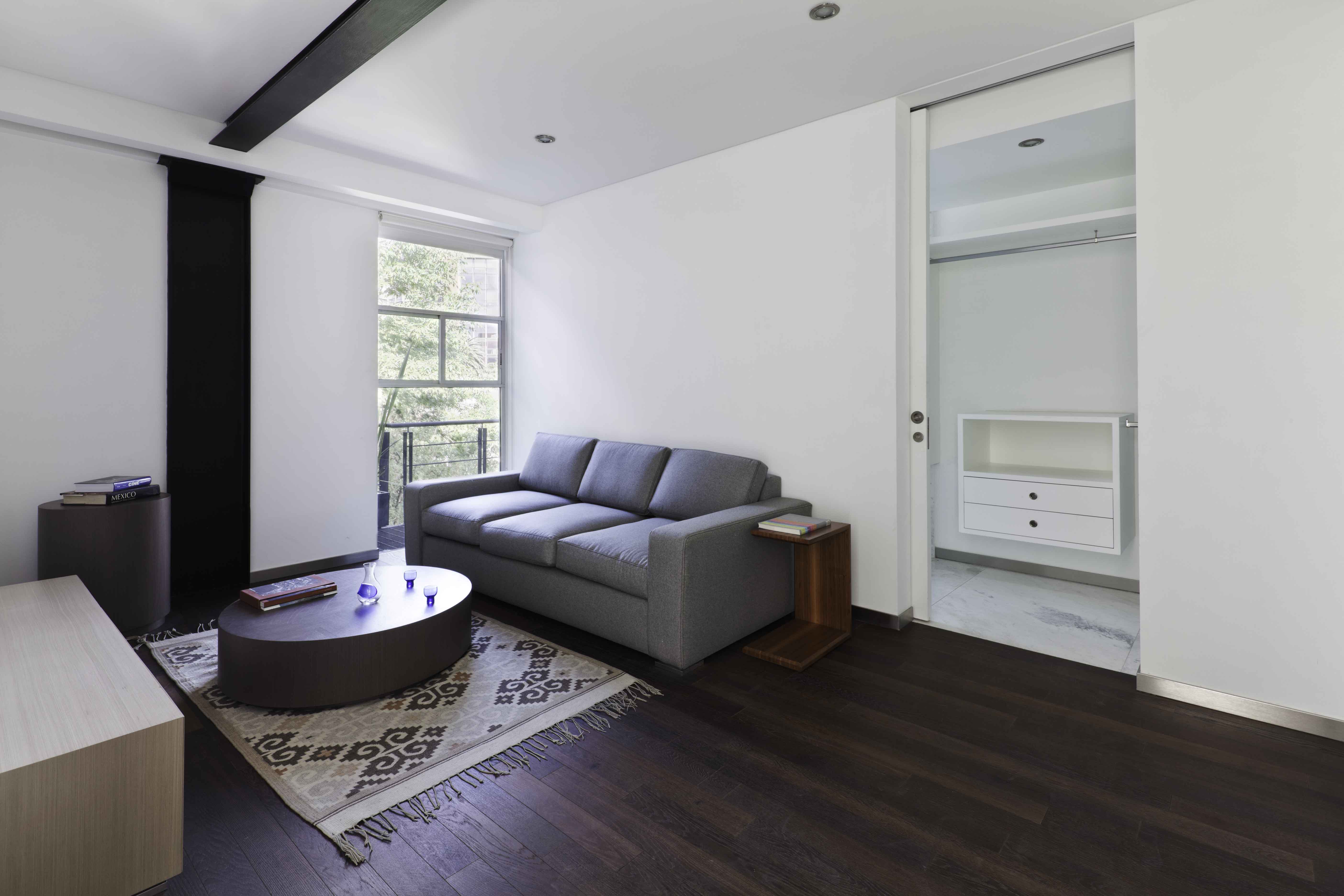 LVII Apartments by Arquitectura En Movimiento