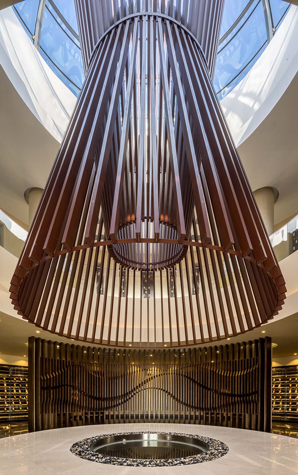 a+a Anderloni Associates designs an irregular golden-colored facade for Yunmo Winery in China