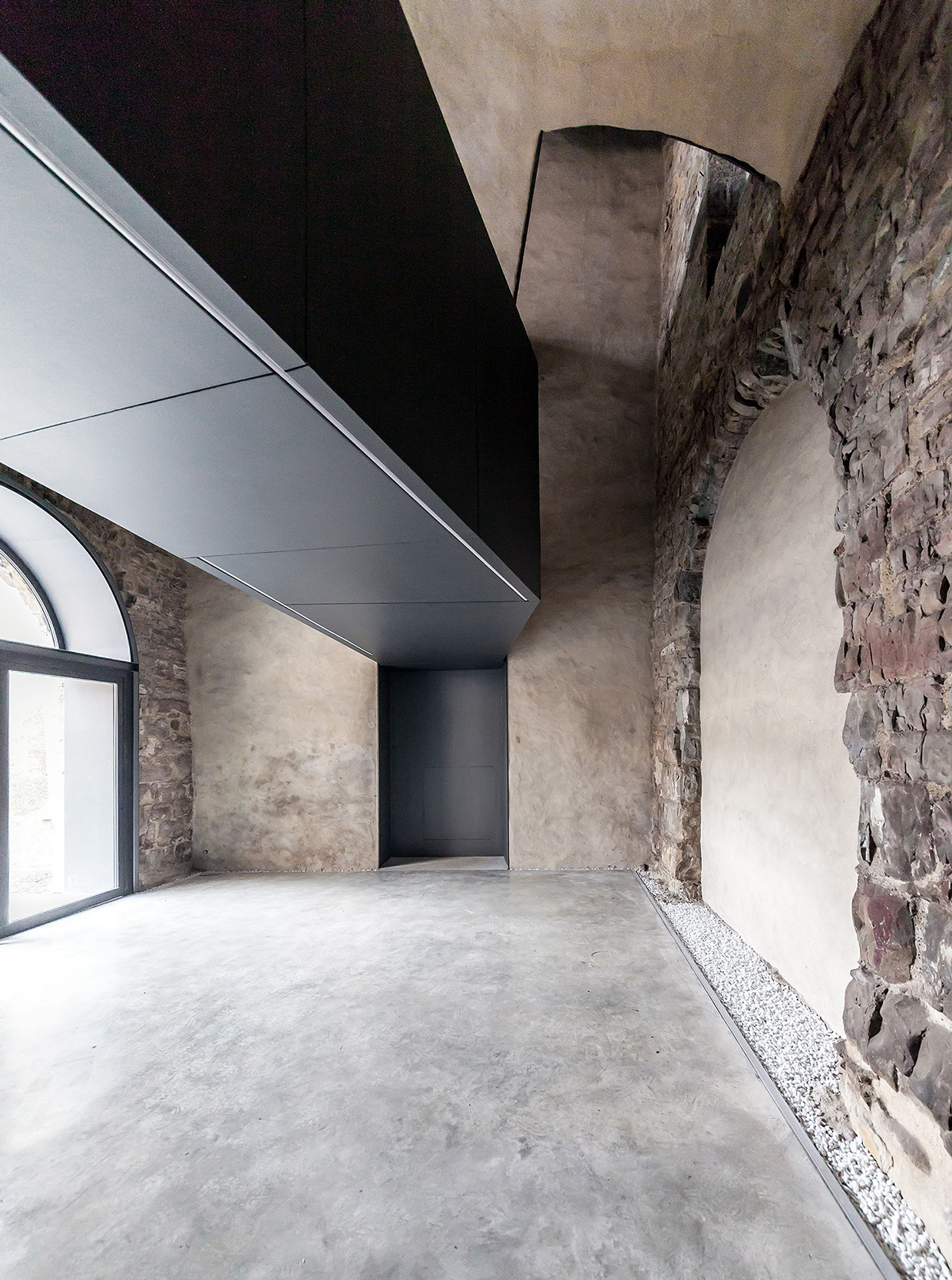 The Torre del Borgo emphasized the historical context of Bergamo by using copper-clad extension