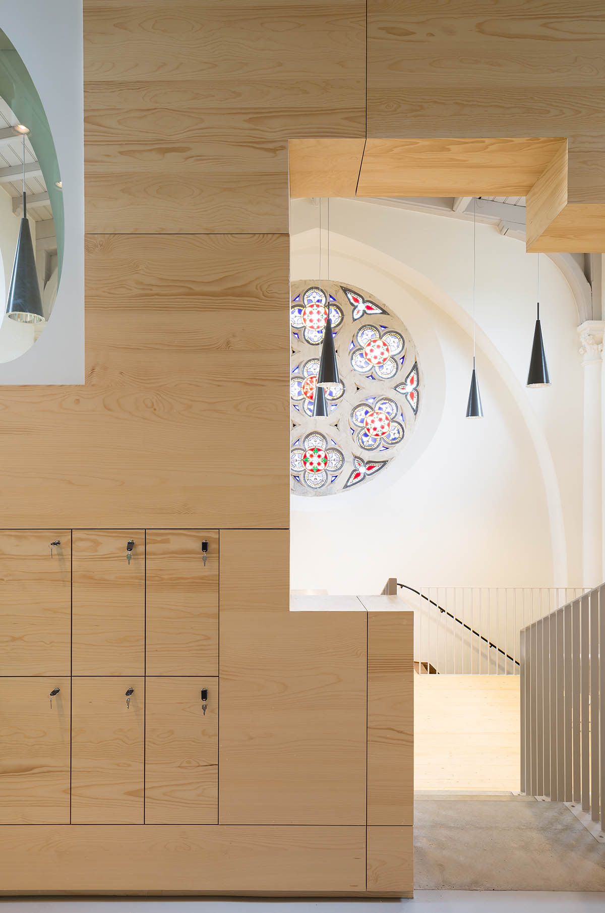 Architect Rob Hootsmans converts old church-style chapel into a new school in Belgium