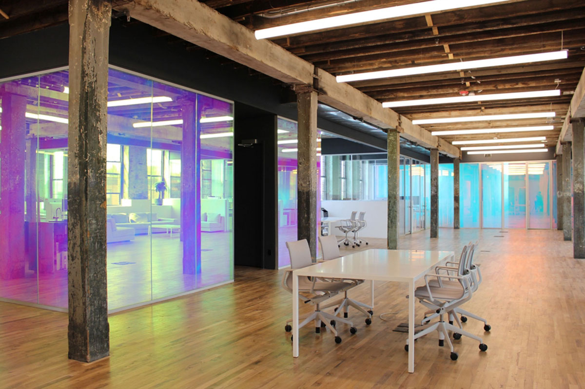 LEESER Architecture transforms an industrial building into office headquarters for Genius Media