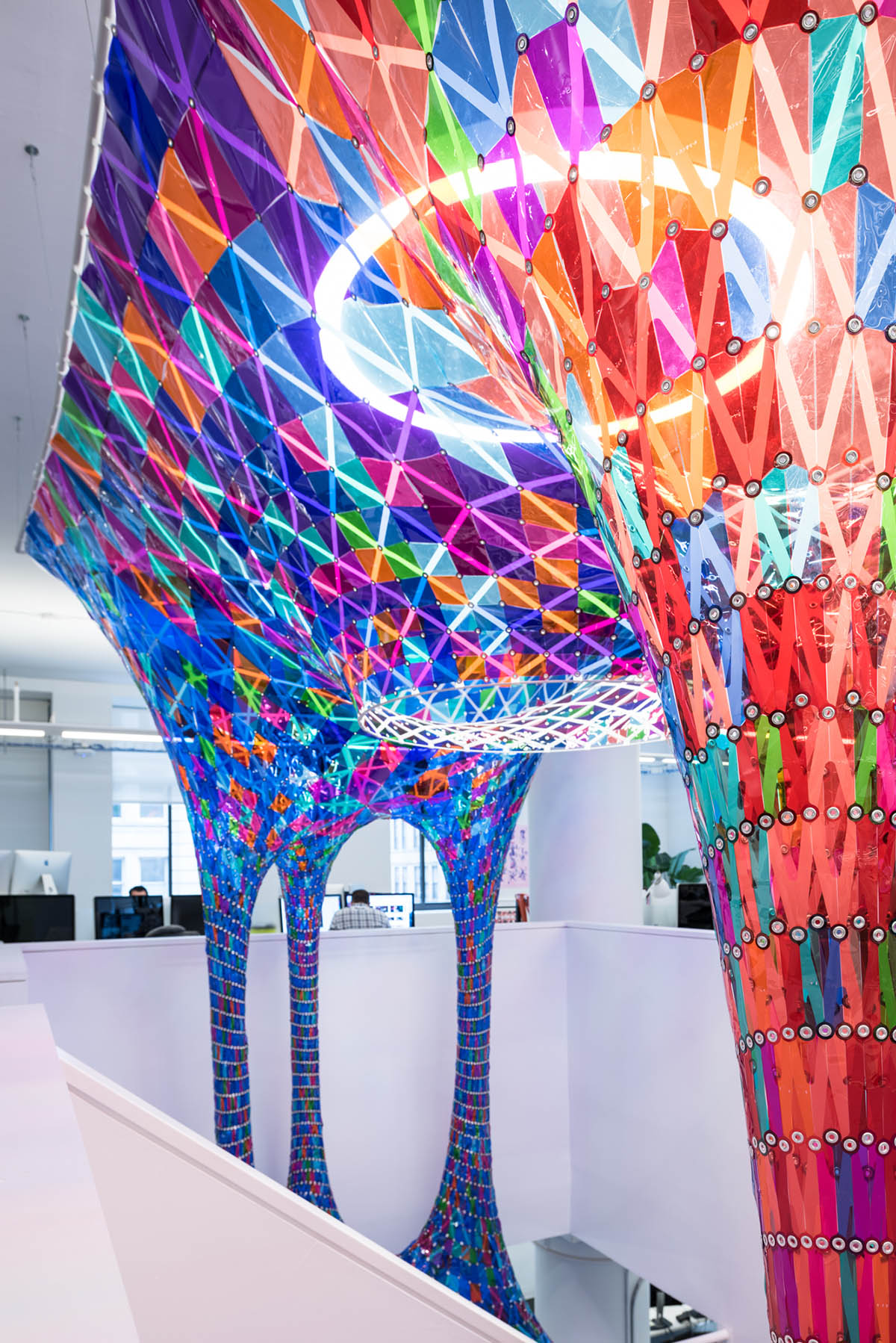 SOFTlab designs a percolating 3D stained glass installation for Behance New York office