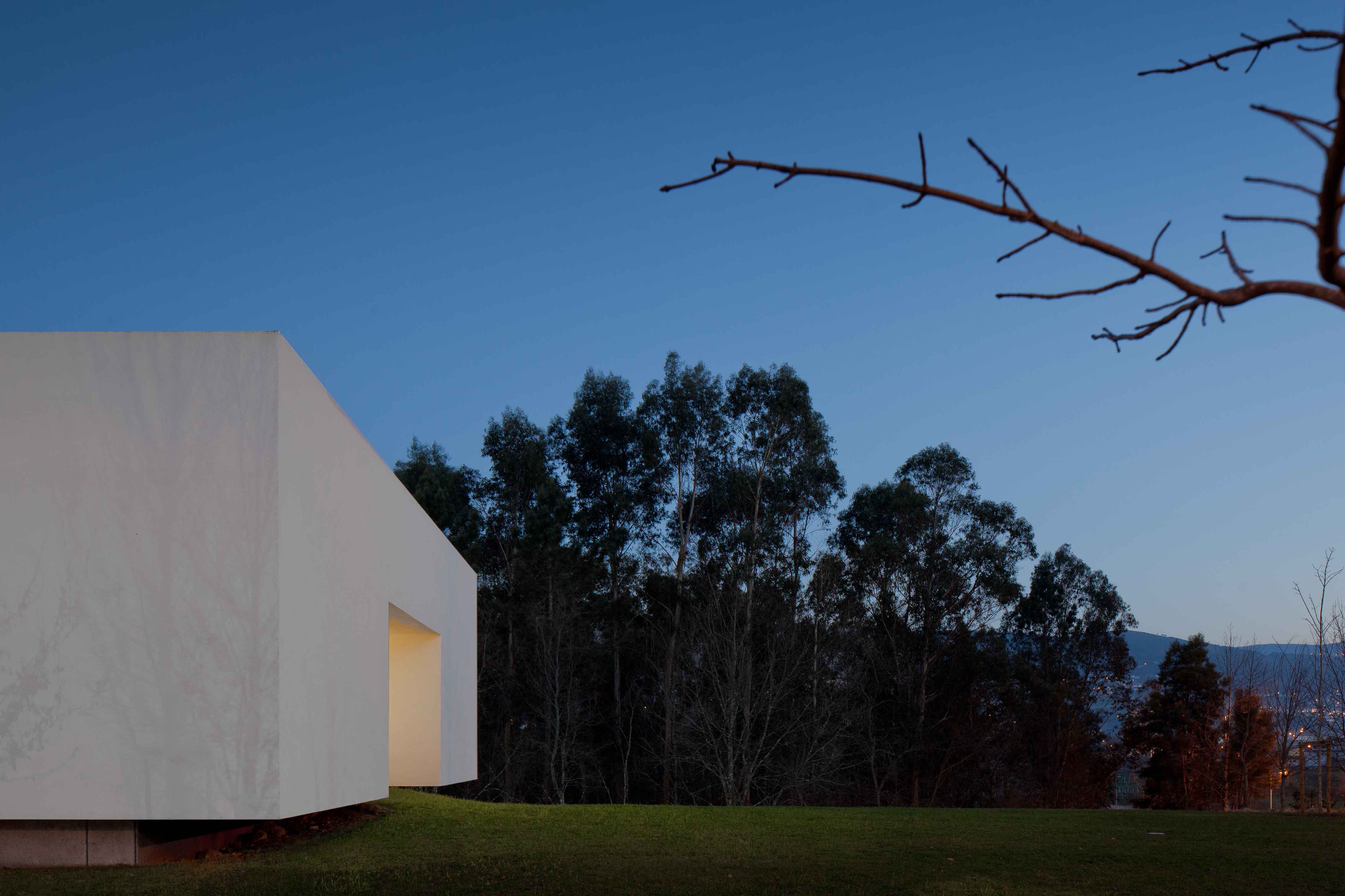 The new Melgaço Sports School is a pure and calm modernist building integrating with landscape