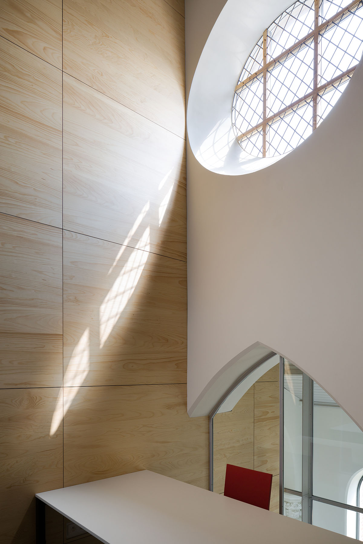 Architect Rob Hootsmans converts old church-style chapel into a new school in Belgium