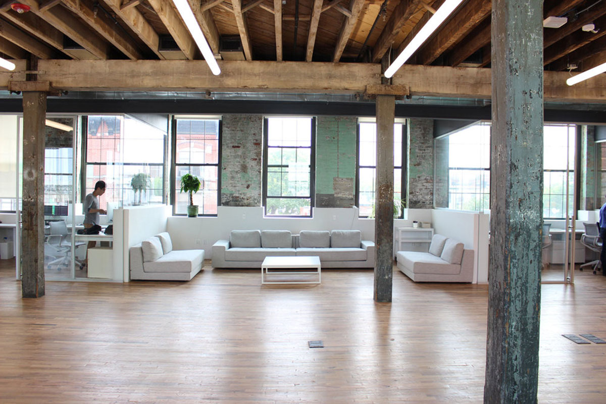 LEESER Architecture transforms an industrial building into office headquarters for Genius Media