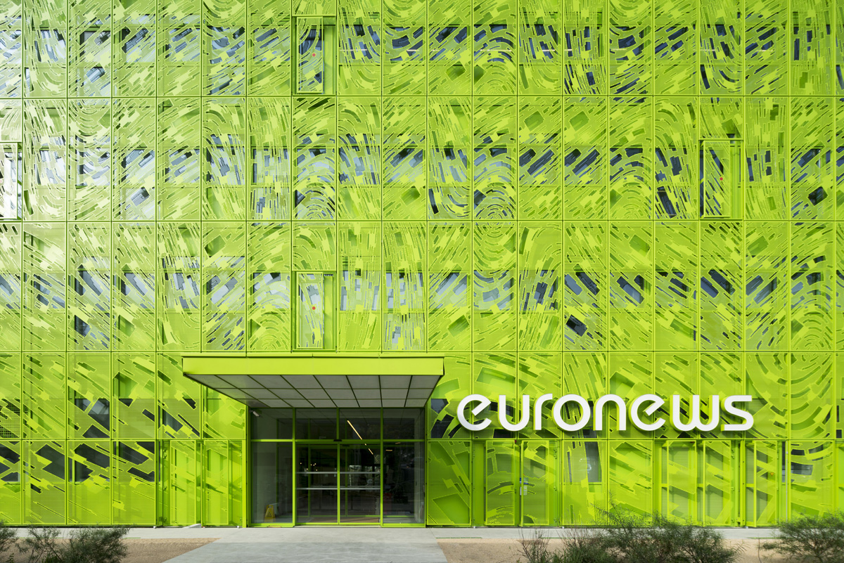 Jacob+Macfarlane’s Euronews HQ becomes a new iconic landmark with its luminous green presence