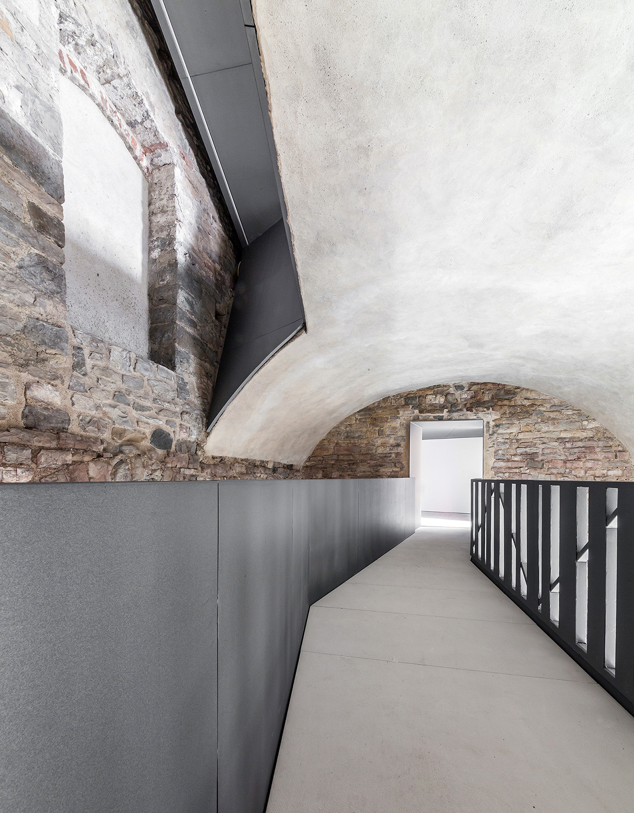 The Torre del Borgo emphasized the historical context of Bergamo by using copper-clad extension