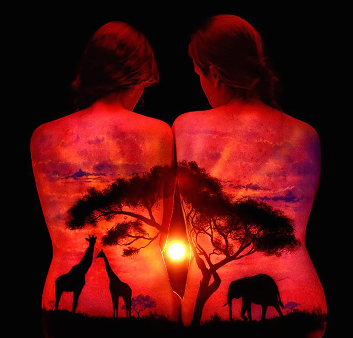 Lighting revives in body paintings that shine with back lights